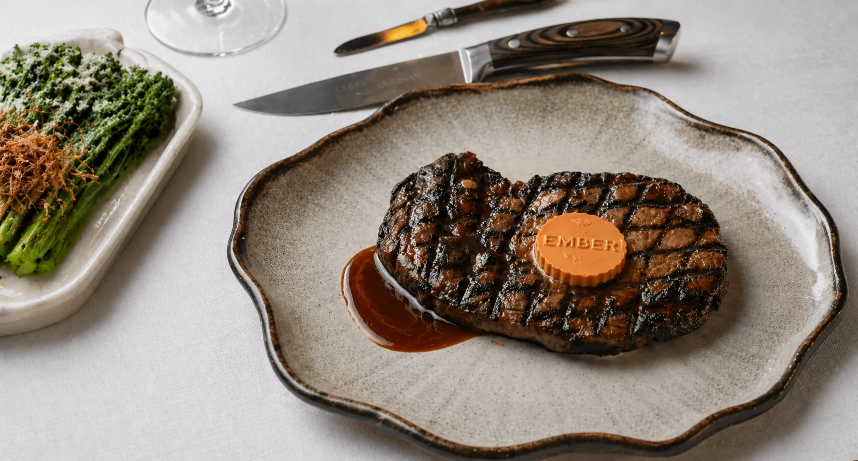Chef's table at the pass, six seats, eight courses.